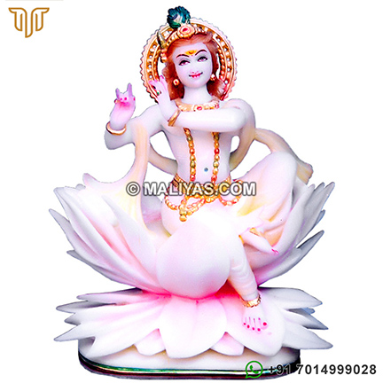 Marble Krishna statue on lots flower