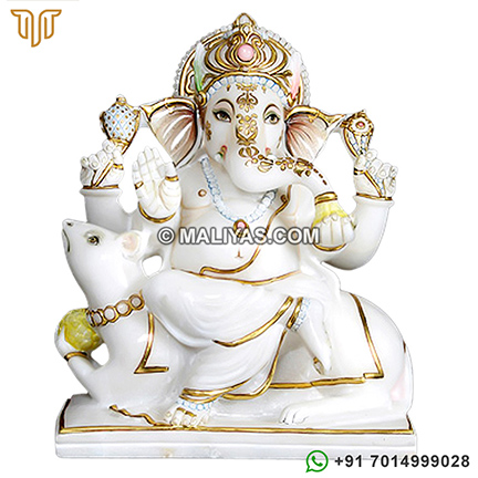 Marble ganesh statue sitting on mouse