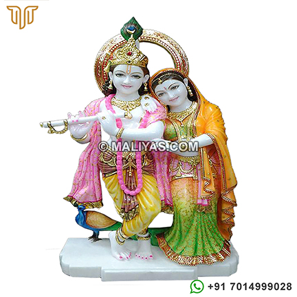Beautiful Lord Radha Krishna carved in marble