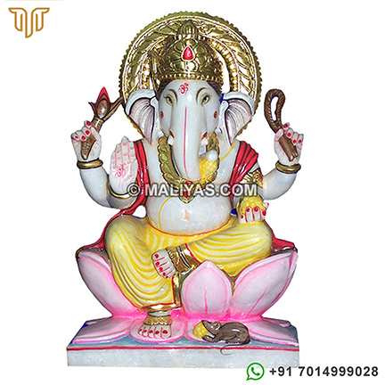 Marble Ganesh Murti seated on lotus flower