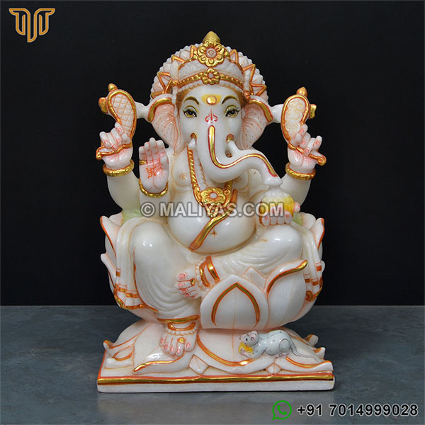 Marble ganesh murti sitting on lotus base