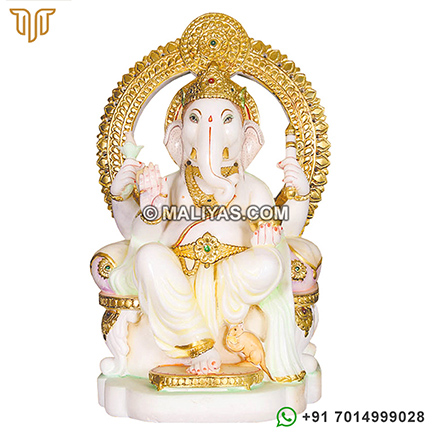 Marble ganesh sitting on singhasan